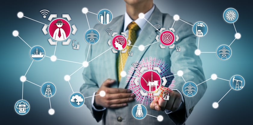 man with diagram in front of him pointing to a button to activate an incident response plan